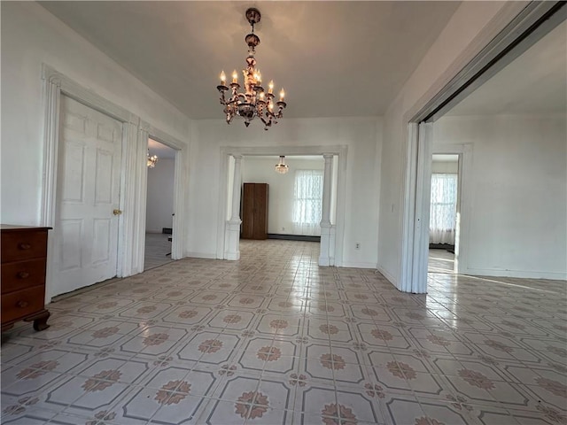 interior space with a notable chandelier and a healthy amount of sunlight