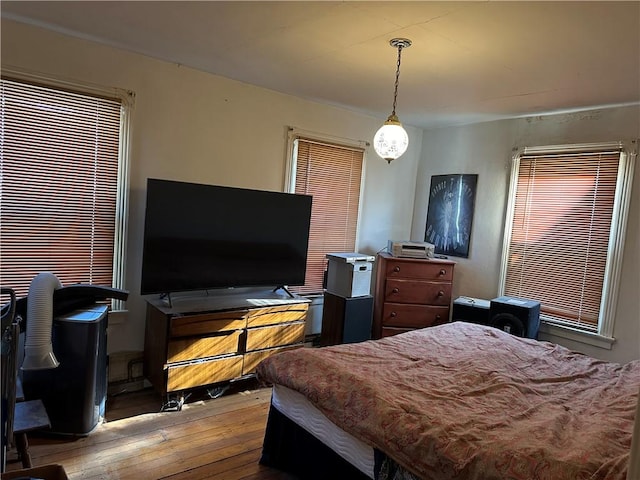 bedroom with light wood-type flooring