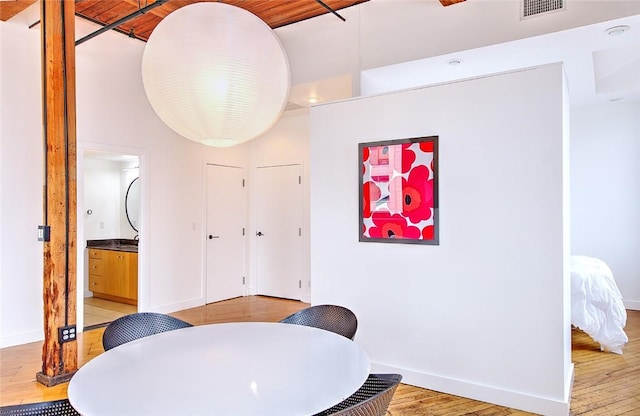 dining room with light wood-type flooring