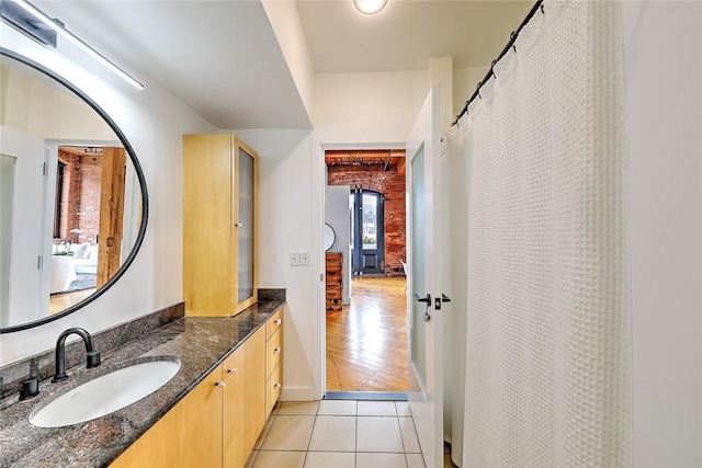 bathroom featuring vanity and tile patterned flooring