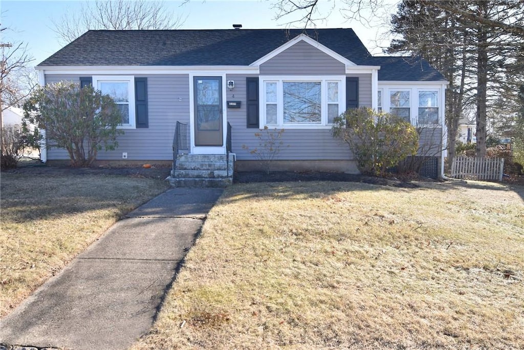 bungalow with a front yard