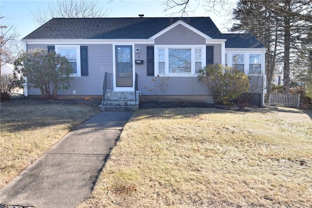 bungalow with a front yard