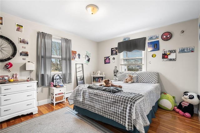 bedroom with light hardwood / wood-style floors