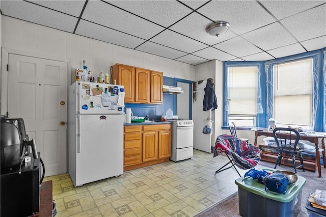 kitchen featuring sink and white appliances