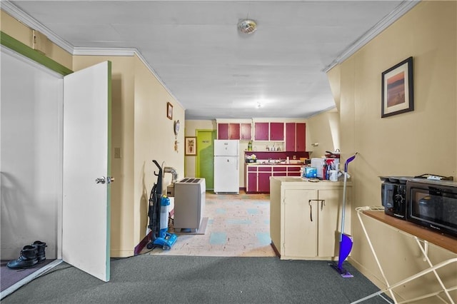 kitchen with carpet, white refrigerator, and crown molding