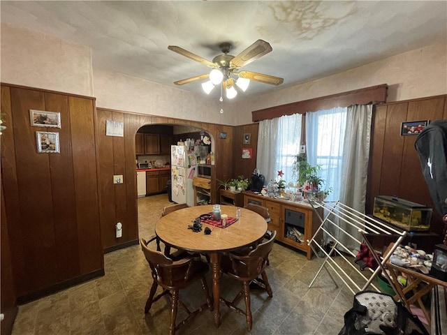 dining room featuring ceiling fan