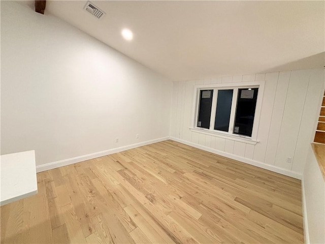 unfurnished room featuring light hardwood / wood-style floors