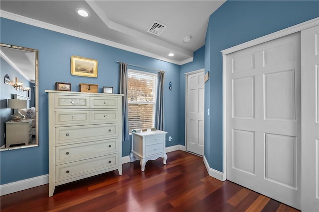 bedroom featuring dark hardwood / wood-style floors and crown molding