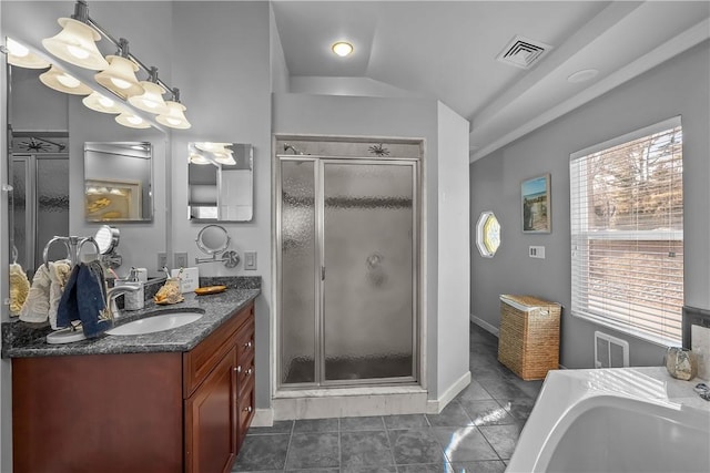 bathroom featuring separate shower and tub, vanity, a wealth of natural light, and lofted ceiling