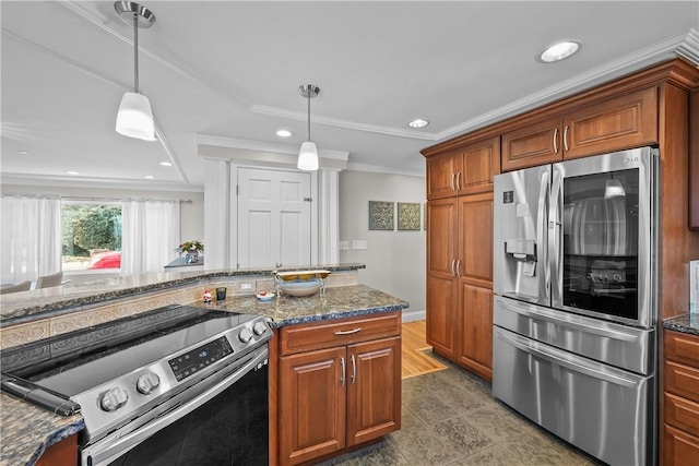 kitchen with appliances with stainless steel finishes, pendant lighting, ornamental molding, and dark stone counters