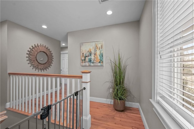 hallway featuring hardwood / wood-style flooring