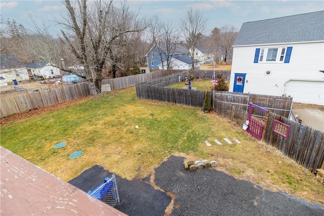 view of yard with a garage