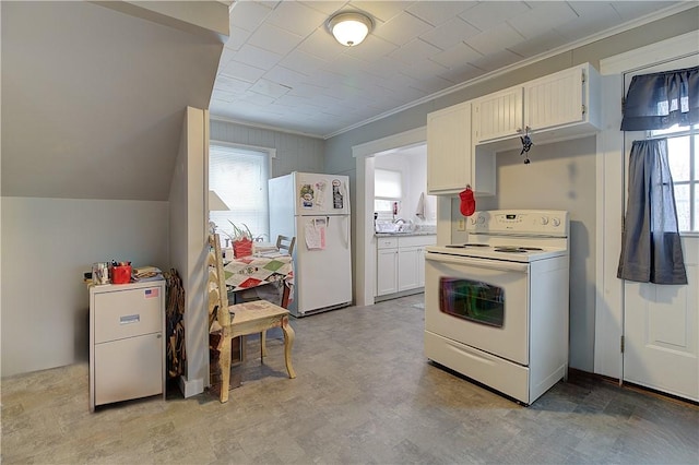 kitchen featuring white cabinetry, ornamental molding, plenty of natural light, and white appliances