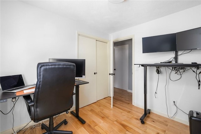 home office featuring hardwood / wood-style flooring