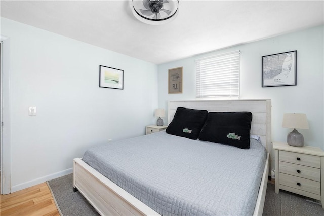 bedroom featuring hardwood / wood-style flooring