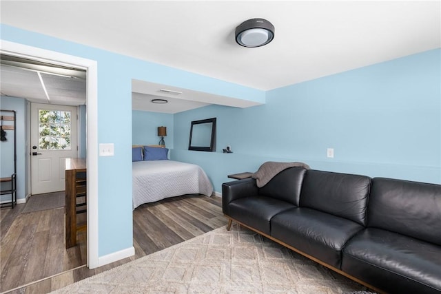 bedroom featuring hardwood / wood-style floors