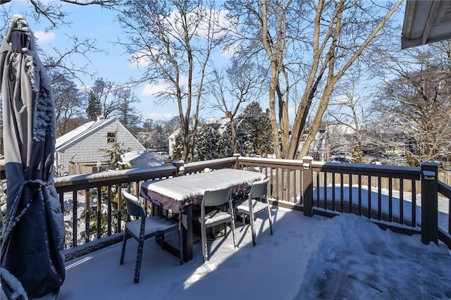 view of snow covered deck