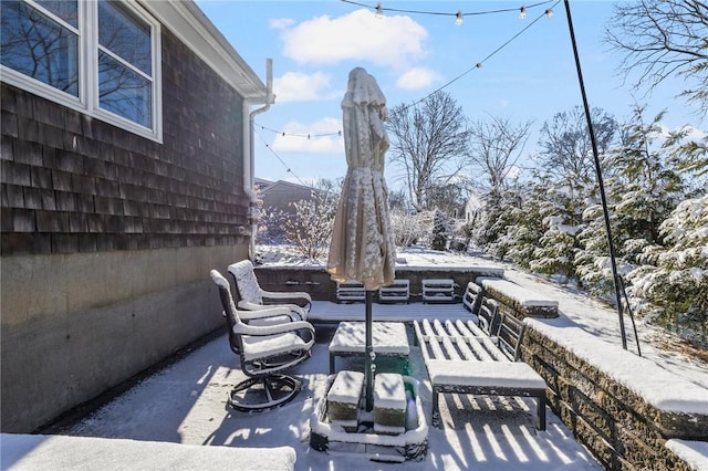 view of snow covered patio