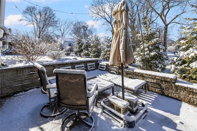 view of snow covered patio