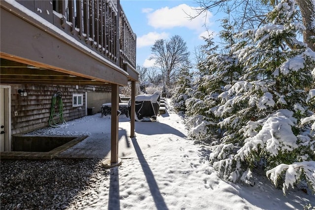 view of yard covered in snow