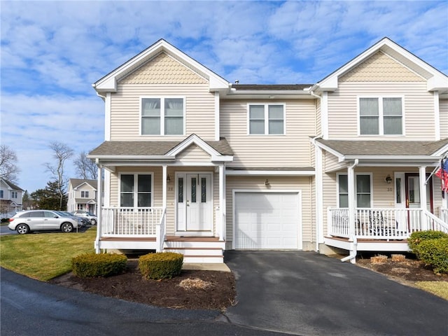 view of front of house featuring a garage and covered porch