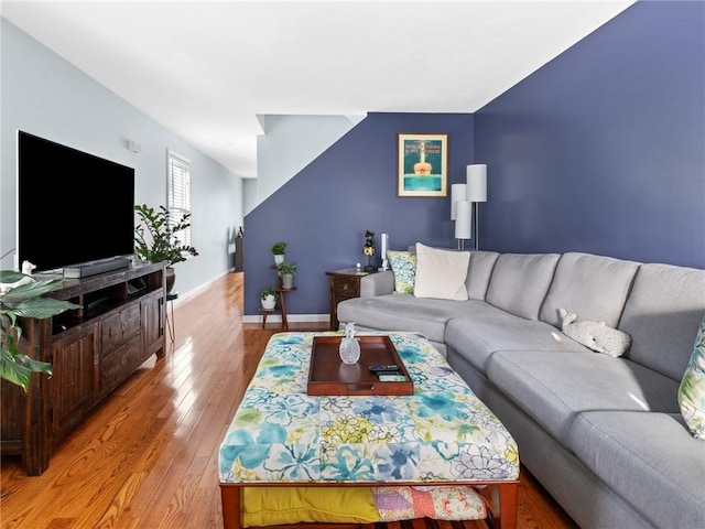 living room with light hardwood / wood-style flooring