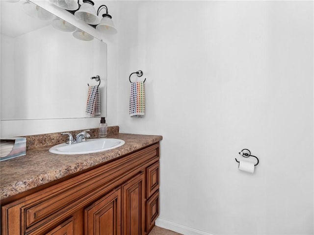 bathroom featuring tile patterned floors and vanity