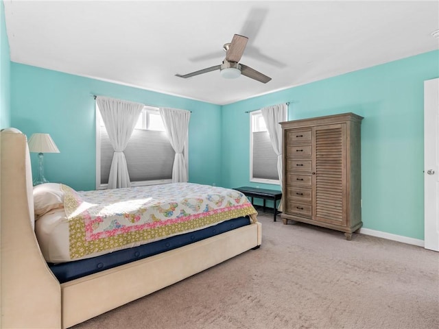 bedroom featuring ceiling fan and carpet floors