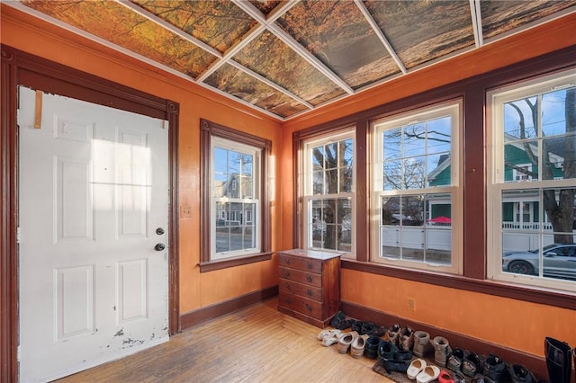 doorway to outside with hardwood / wood-style flooring