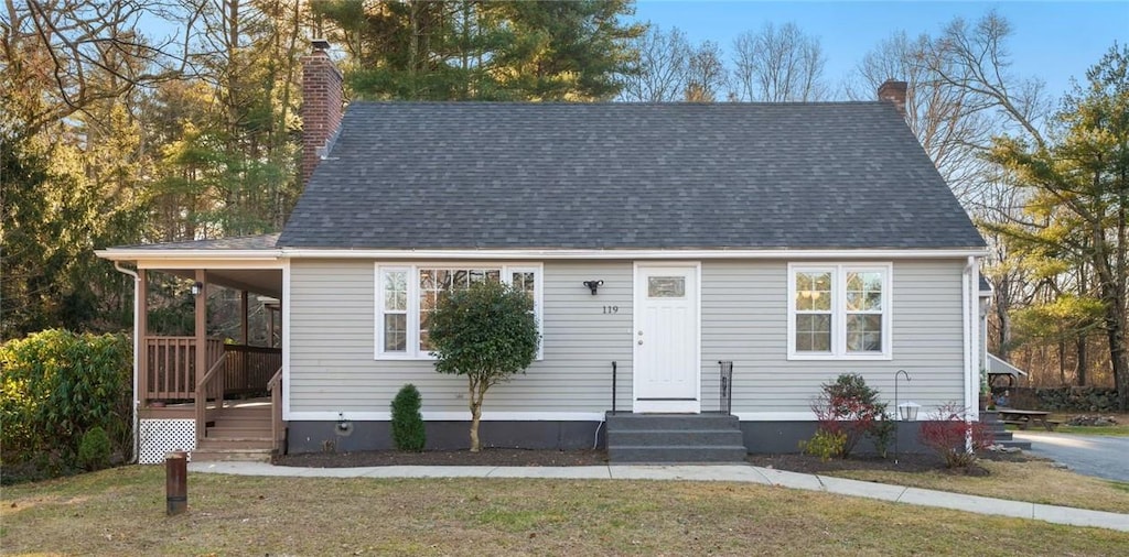 view of front of home with a front yard