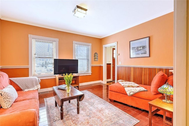 living room featuring crown molding