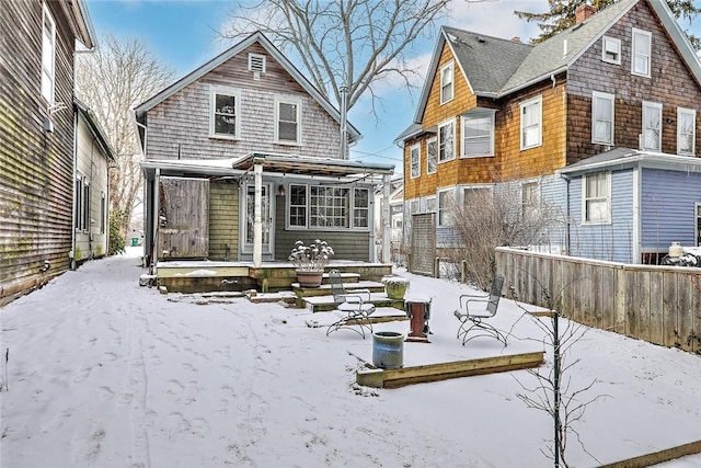 view of snow covered house