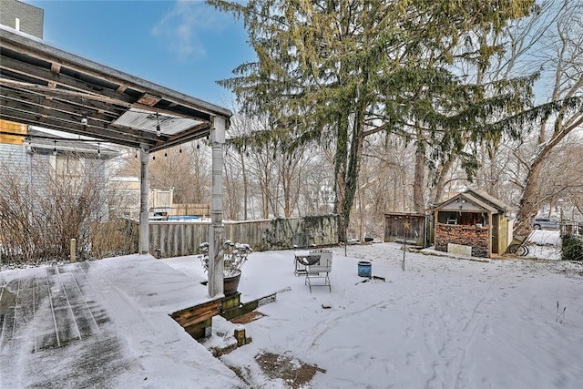 view of yard covered in snow