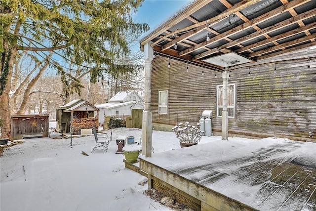 view of snow covered patio