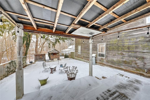 view of snow covered patio