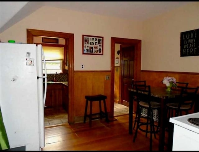 dining area with hardwood / wood-style flooring