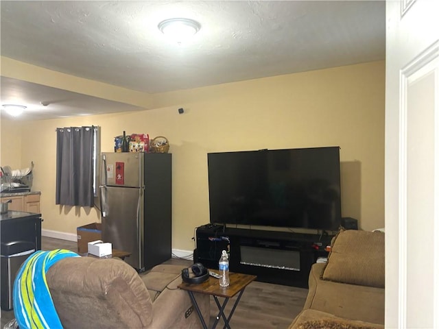 living room with dark hardwood / wood-style flooring