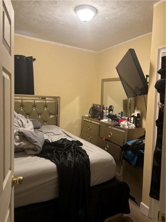 bedroom with a textured ceiling