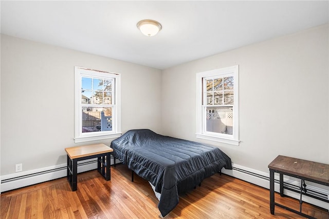 bedroom with wood-type flooring