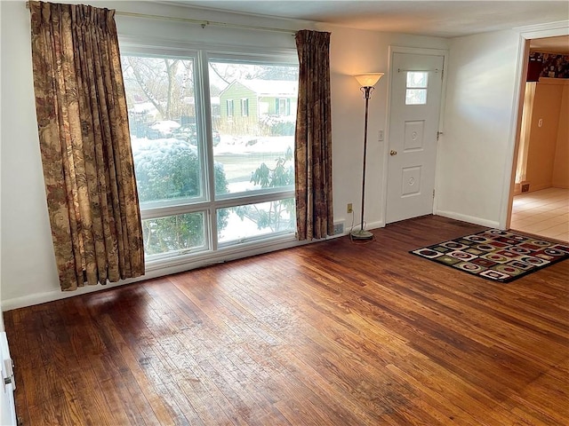 entrance foyer featuring hardwood / wood-style flooring