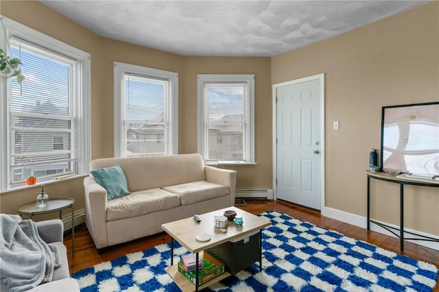 living room featuring dark wood-type flooring and a baseboard radiator