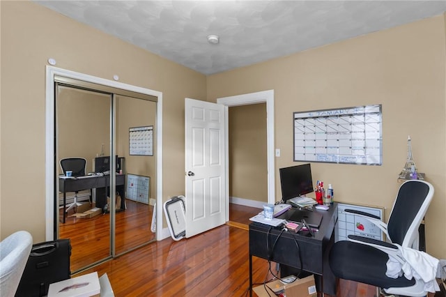 office area with dark hardwood / wood-style floors