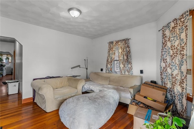 living room with dark wood-type flooring