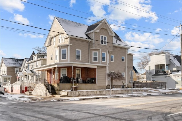 view of front of home featuring covered porch