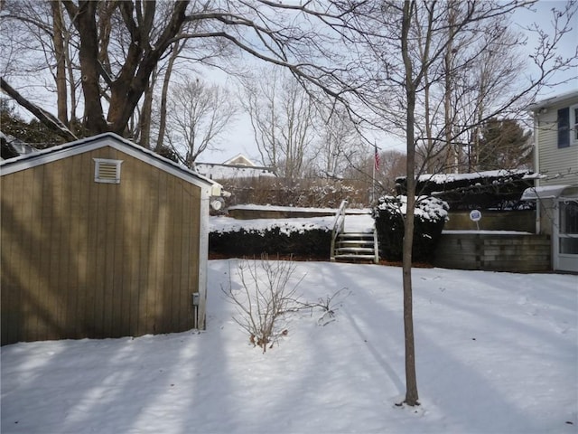 view of yard covered in snow