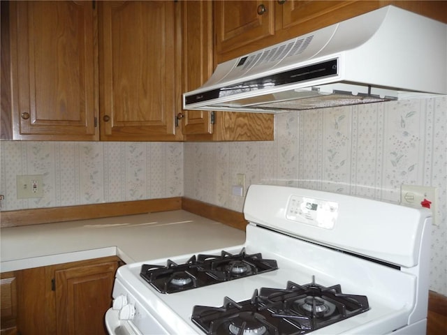 kitchen featuring white gas range oven