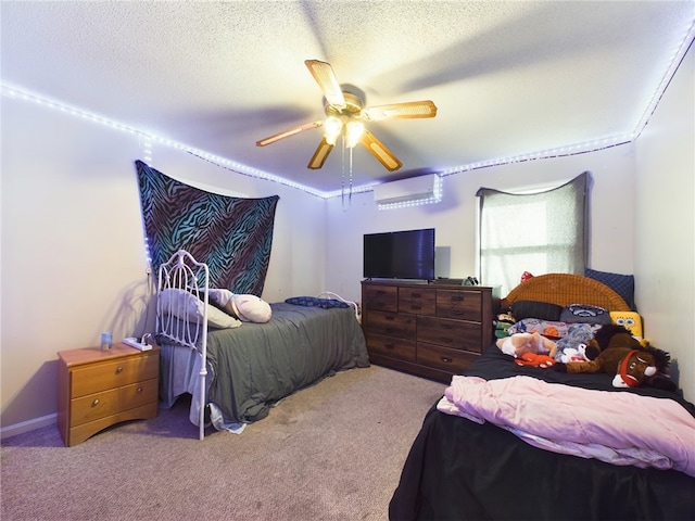 carpeted bedroom with ceiling fan, an AC wall unit, and a textured ceiling