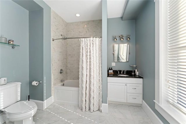 full bathroom with toilet, vanity, and shower / tub combo with curtain