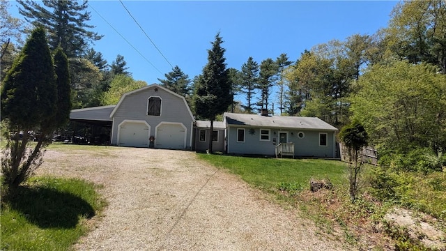 157 Biscuit City Rd, Charlestown, RI 02813 - view of front of home featuring a front yard, driveway, a gambrel roof, and a garage