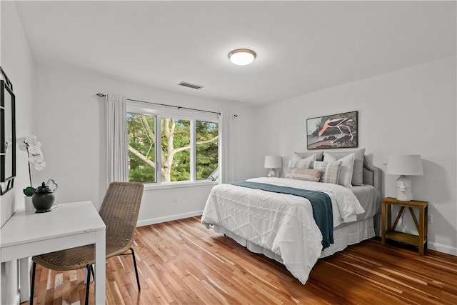 bedroom featuring hardwood / wood-style floors